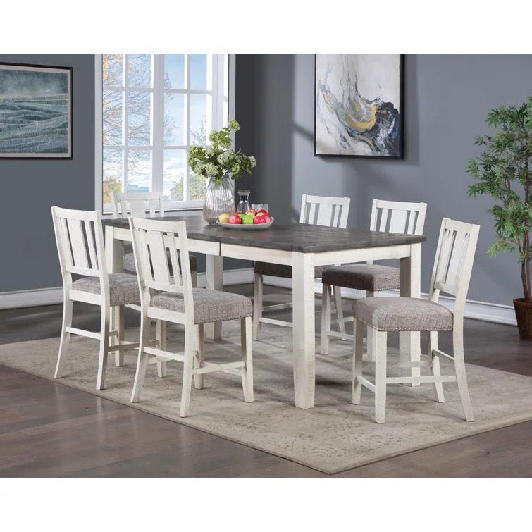 6 Chairs and an expandable Table in white wash finish