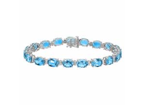 Image for 27 CT T.W. Oval Cut Blue Topaz and Diamond Bracelet in 14 Karat White Gold