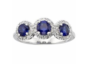 Image for Three Stone Blue Sapphire and 0.19 CT. T.W. Diamond Ring in 14K White Gold