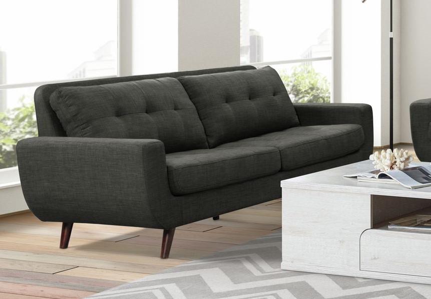 gray designer sofa with 2 pillows